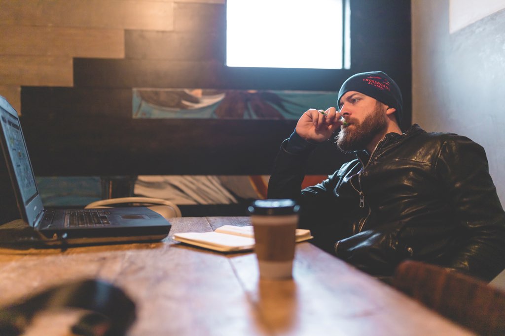 John Crestani at computer